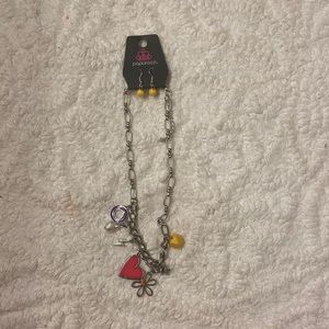 Silver chain necklace with yellow earrings